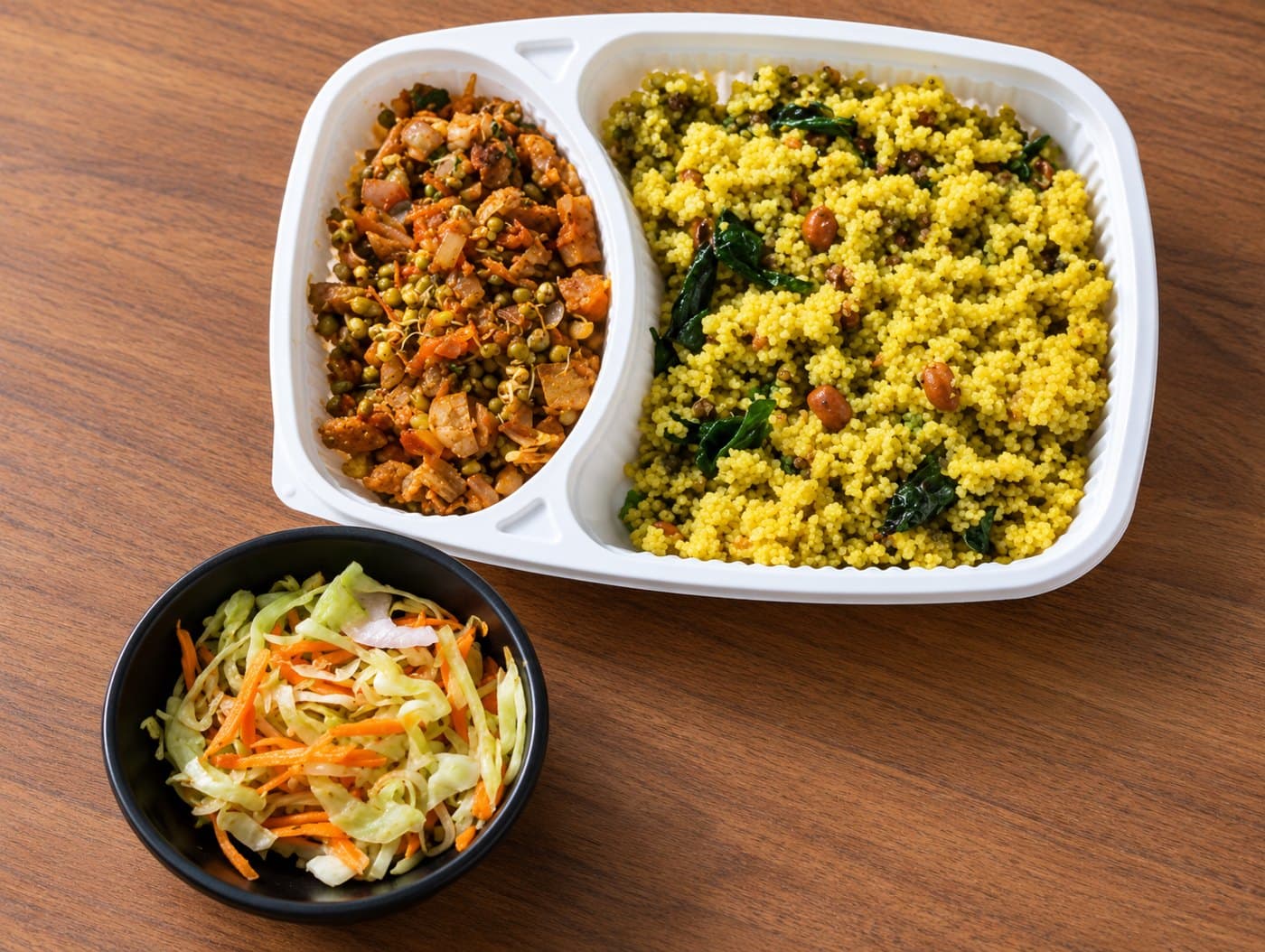 Kefilo meal with grains and vegetables